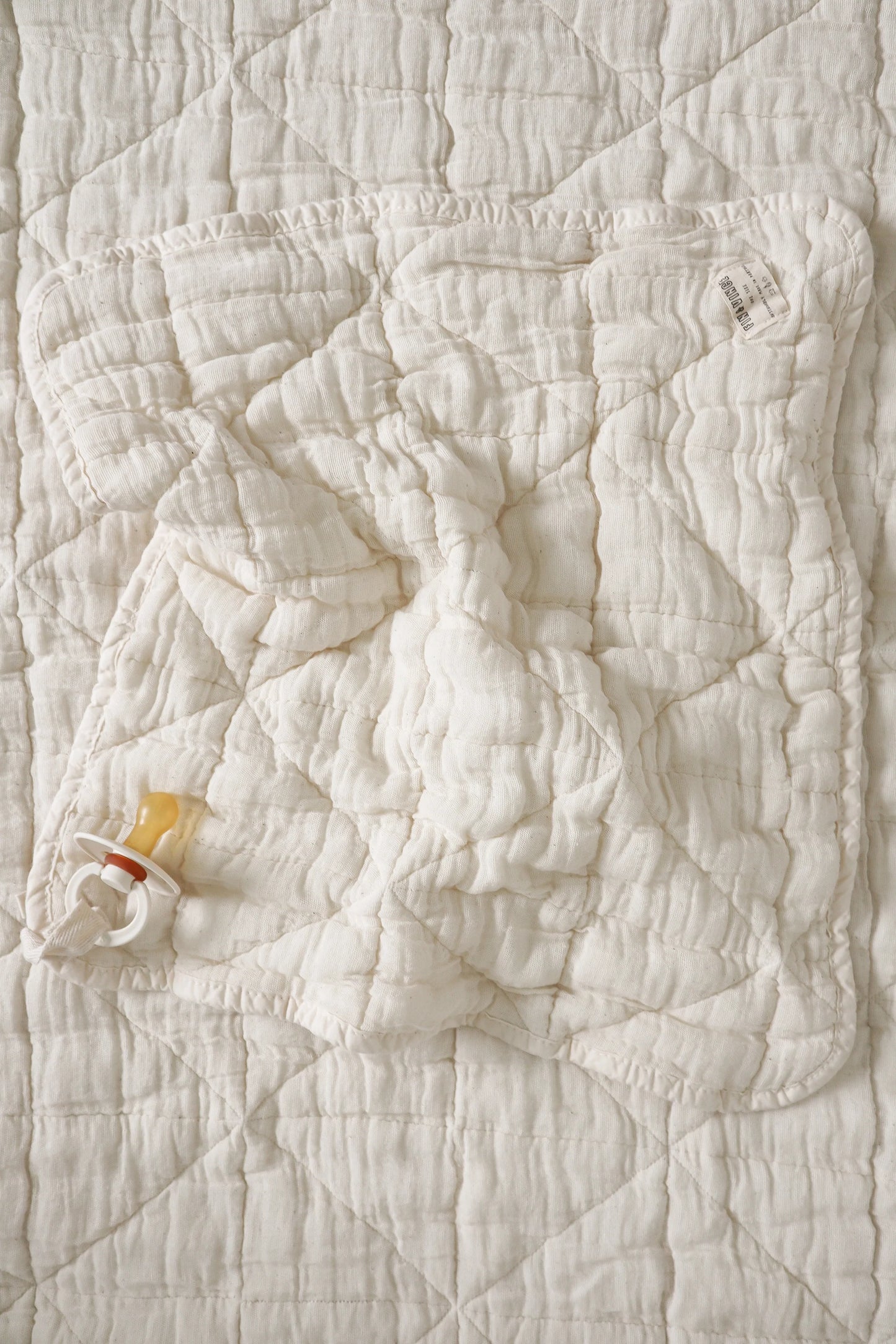 lovie quilted | mini - natural