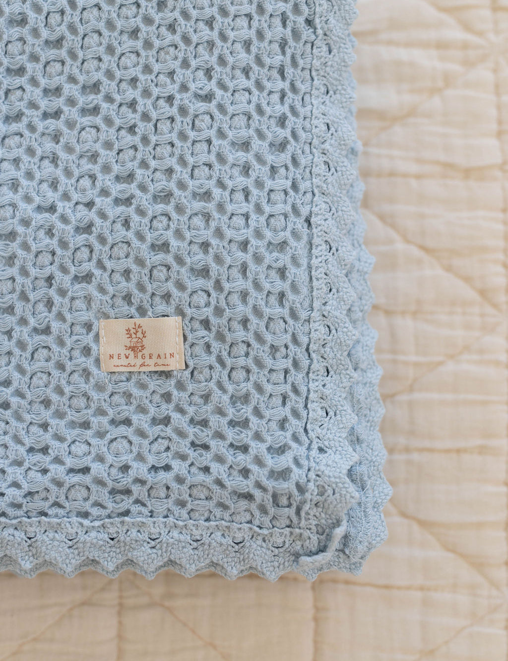 cozy waffle blanket | baby size - powder